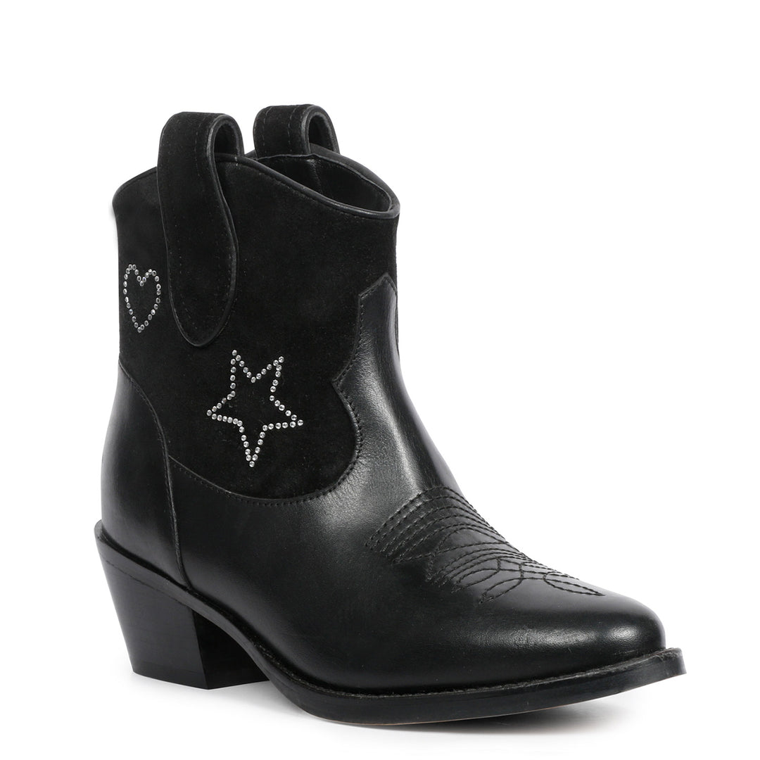 Elegant black leather boots with metallic silver stars, a trendy addition to your wardrobe
