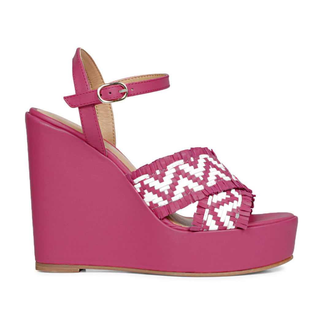 Elevate your look with Saint Glenda's handwoven hot pink wedge heels
