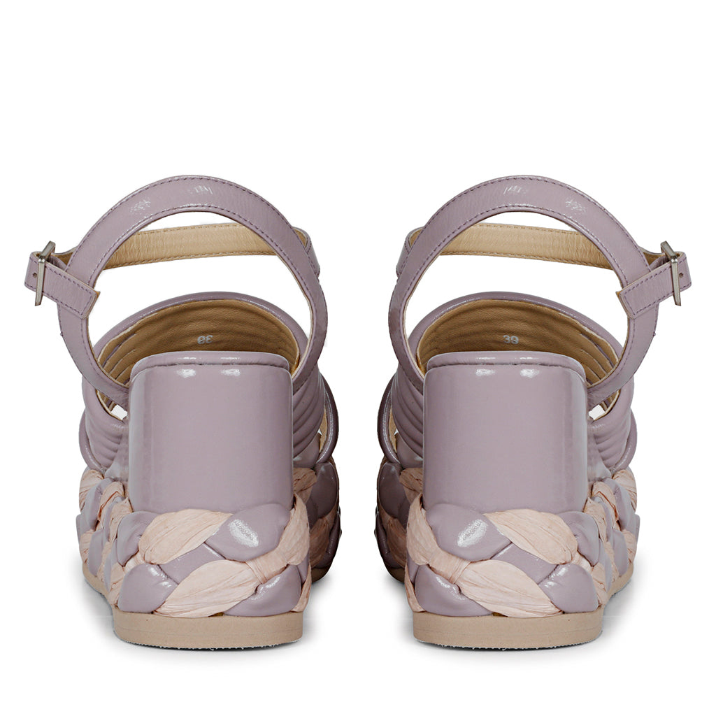Step out in fashion with lilac leather platform sandals."