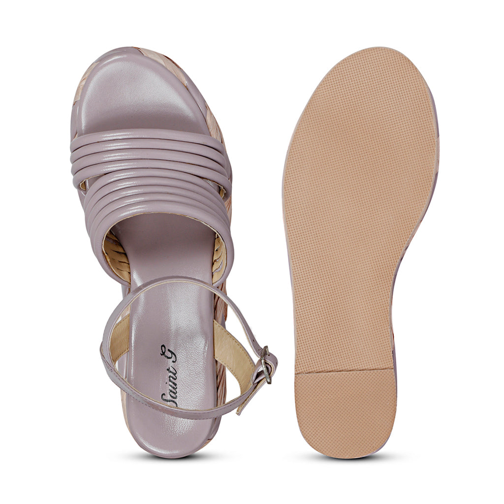 Step out in fashion with lilac leather platform sandals."