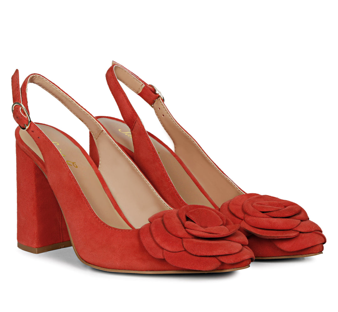 Red suede leather heels with floral embellishments - Saint Naiya's elegant statement footwear