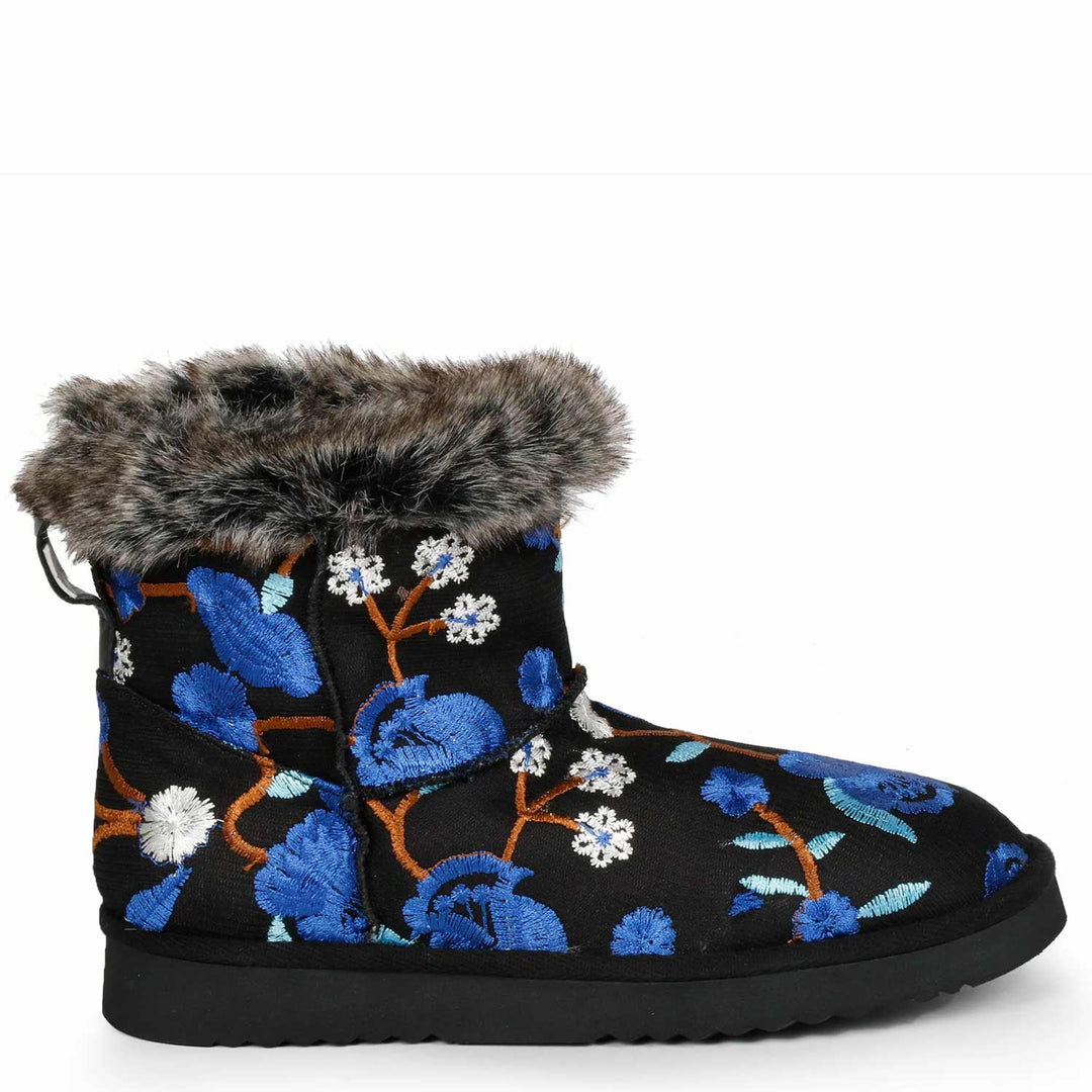 Suede leather snug boots with vibrant blue floral embroidery by Saint Clarisse