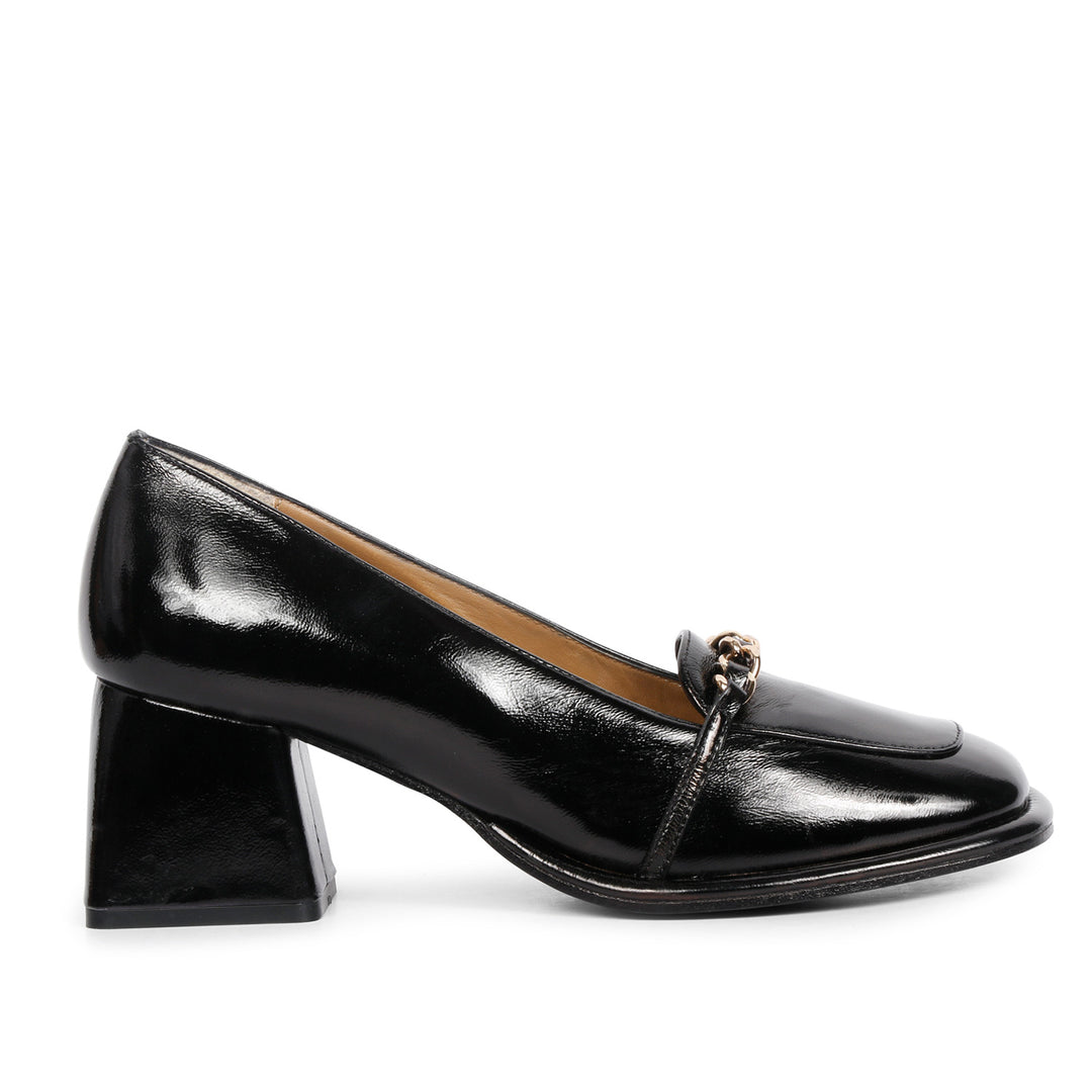 Step into luxury: Saint Mirielle's black patent leather moccasins - handcrafted perfection
