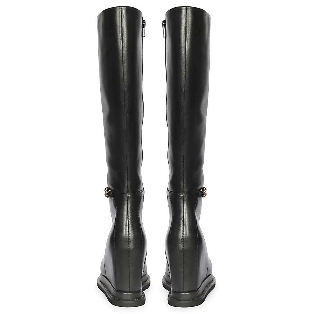 A pair of black leather knee-high boots shown from the back
