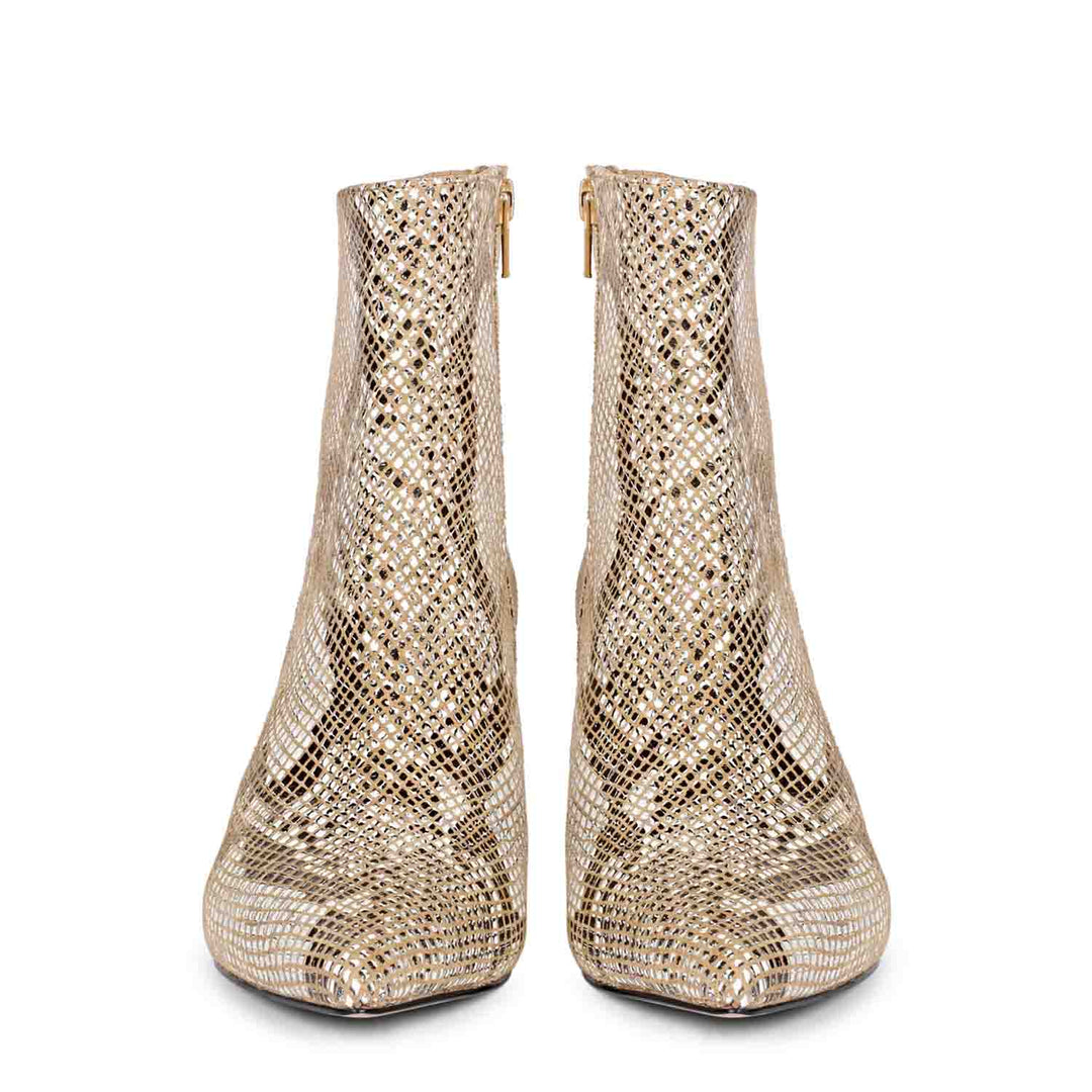 Trendy snake print ankle boots with kitten heels by Saint Lottie.