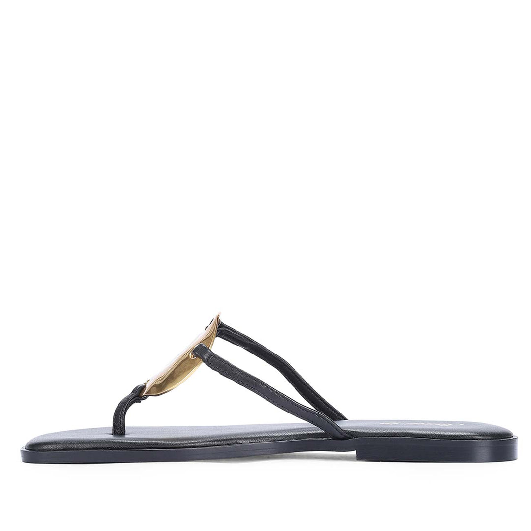 Saint Aurum Golden Disc Black Leather Flats