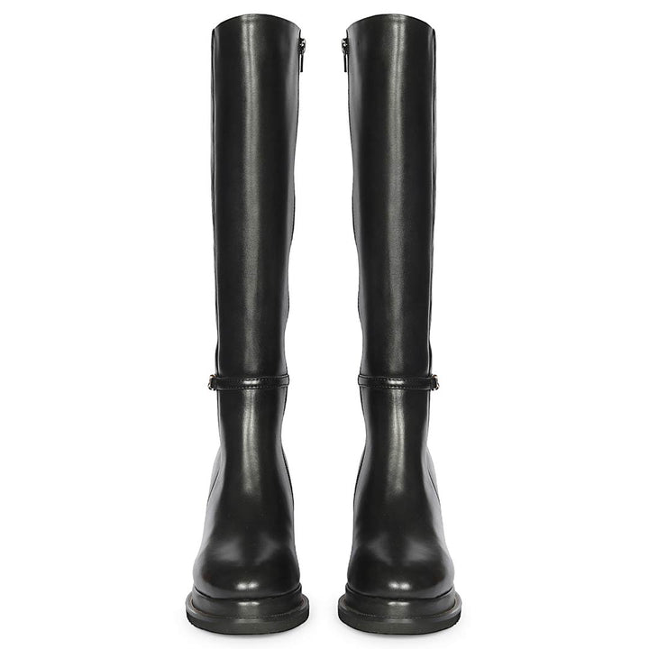 A pair of black leather knee-high boots with side zippers and a decorative strap detail near the ankle