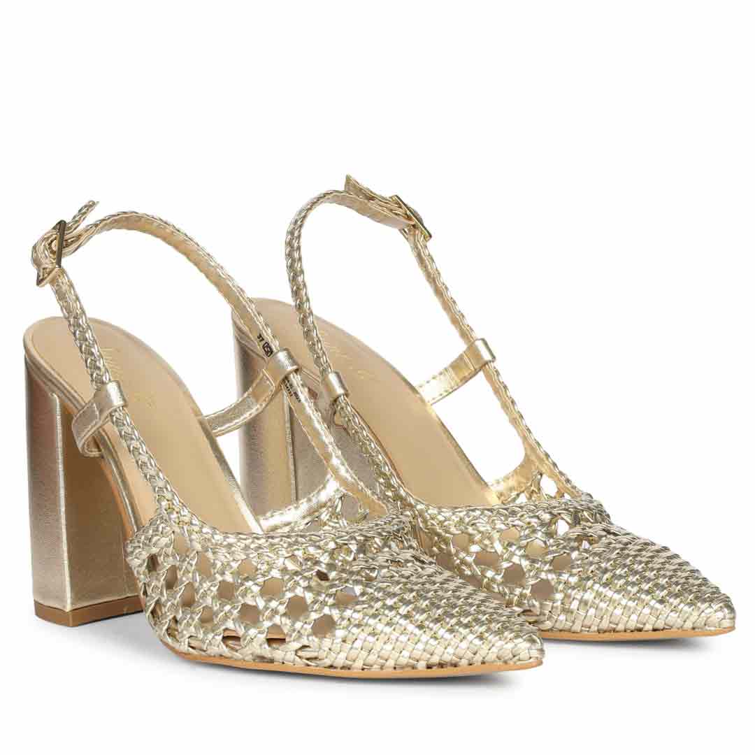A pair of metallic gold slingback high heels