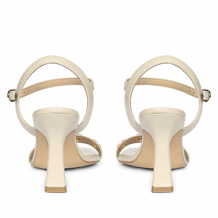 Saint Dahlia Gold Flower Eyelets Stone Leather Heels