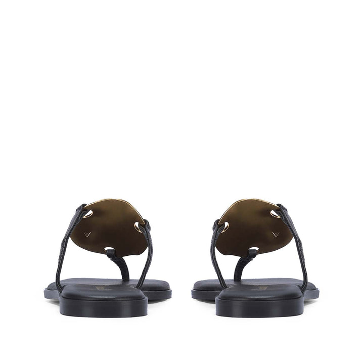 Saint Aurum Golden Disc Black Leather Flats