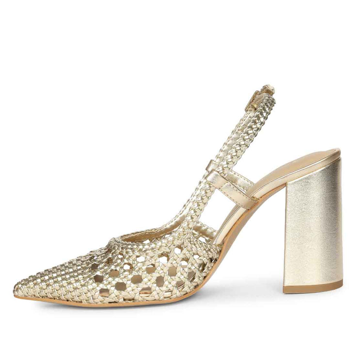 A metallic gold slingback sandal with a pointed toe