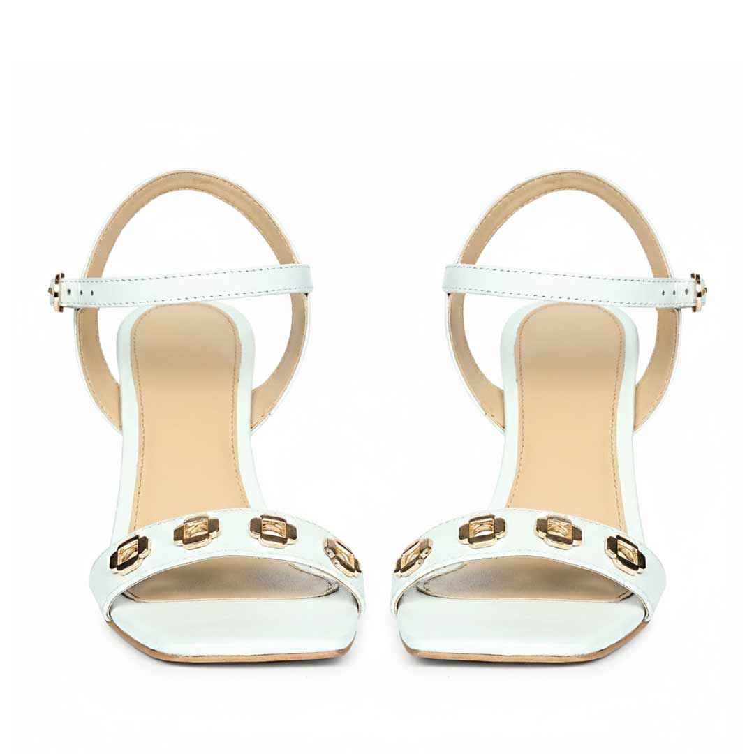 Saint Dahlia Gold Flower Eyelets Sky Leather Heels