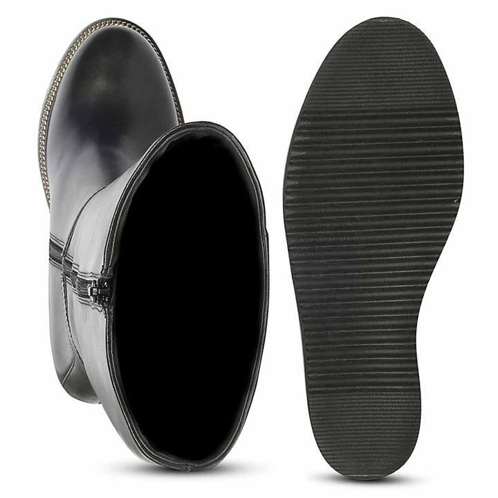 A pair of black rain boots shown display the side zipper and the other lying flat to show the textured treaded sole.