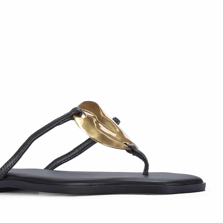 Saint Aurum Golden Disc Black Leather Flats