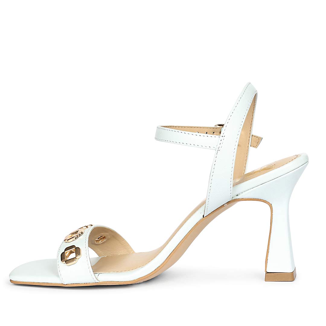 Saint Dahlia Gold Flower Eyelets Sky Leather Heels