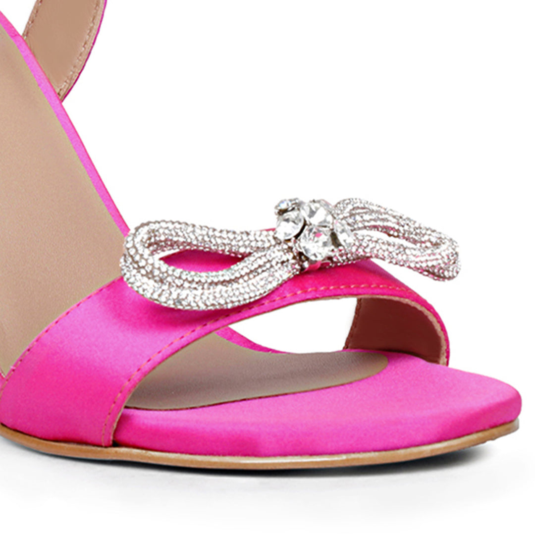Saint Hayden's stilettos: hot pink, leather-satin, crystal bow for chic style