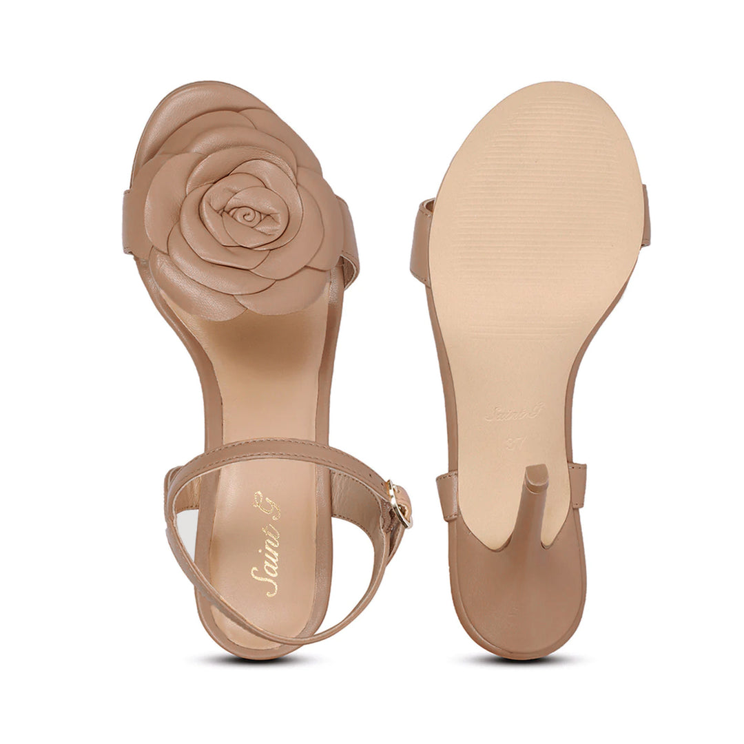 Fashion-forward Cuio Leather Stilettos by Saint Veronique adorned with delicate flower details - a must-have for any occasion