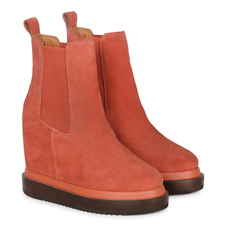 Sleek and stylish Saint Sylvie Orange Wedge Boots with leather inner, offering comfort and elevated fashion in every step