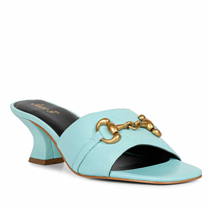 Sophisticated elegance: Saint Bianca Sky Blue Leather Gold Horsebit Sculpted Mid Heels, a perfect blend of style and comfort