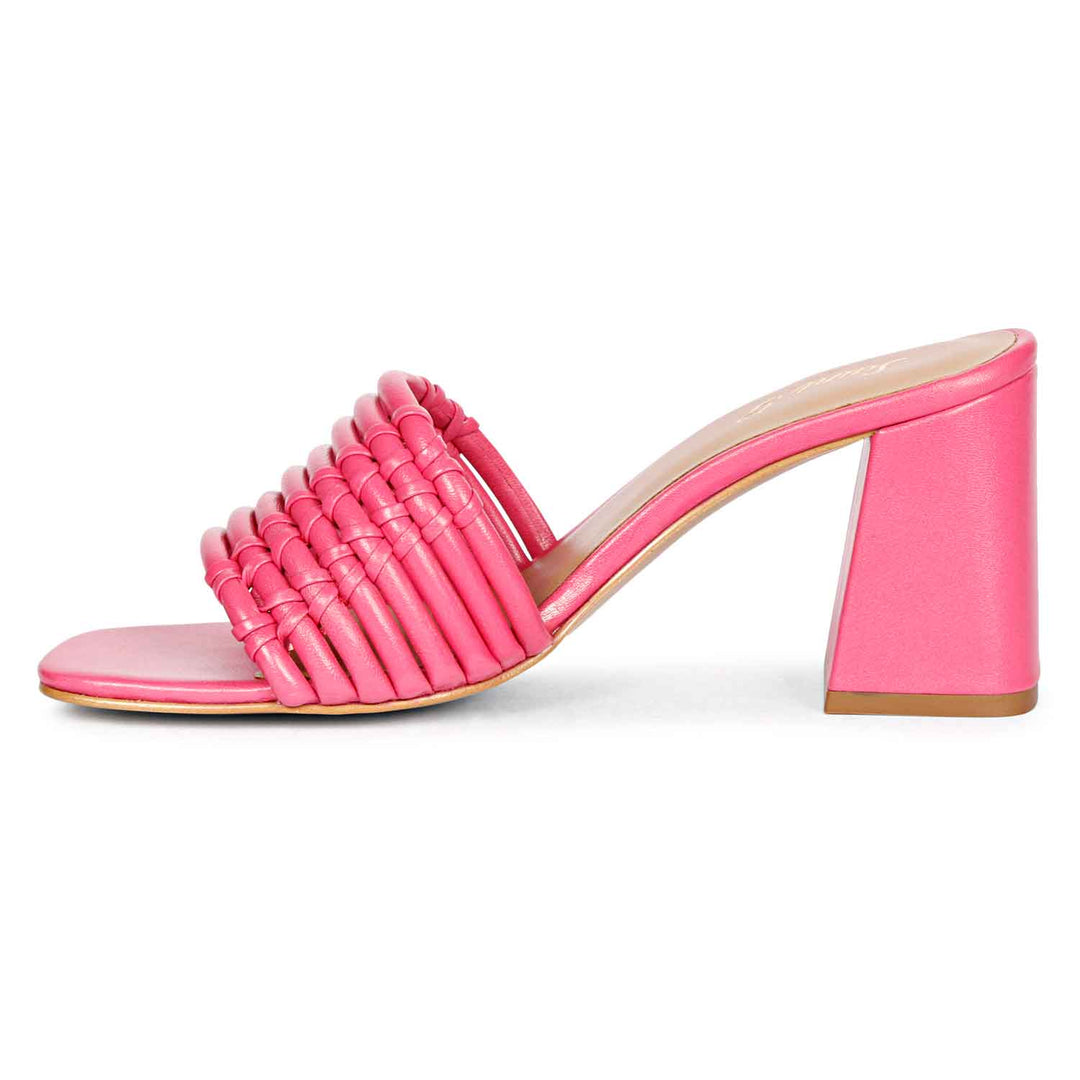 Strappy hot pink heels by Saint Bethany - elevate your style with these leather block heels