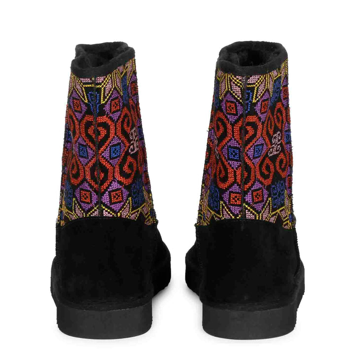 Luxurious Saint Elaine boots: Black suede, snug design, and exquisite embroidery