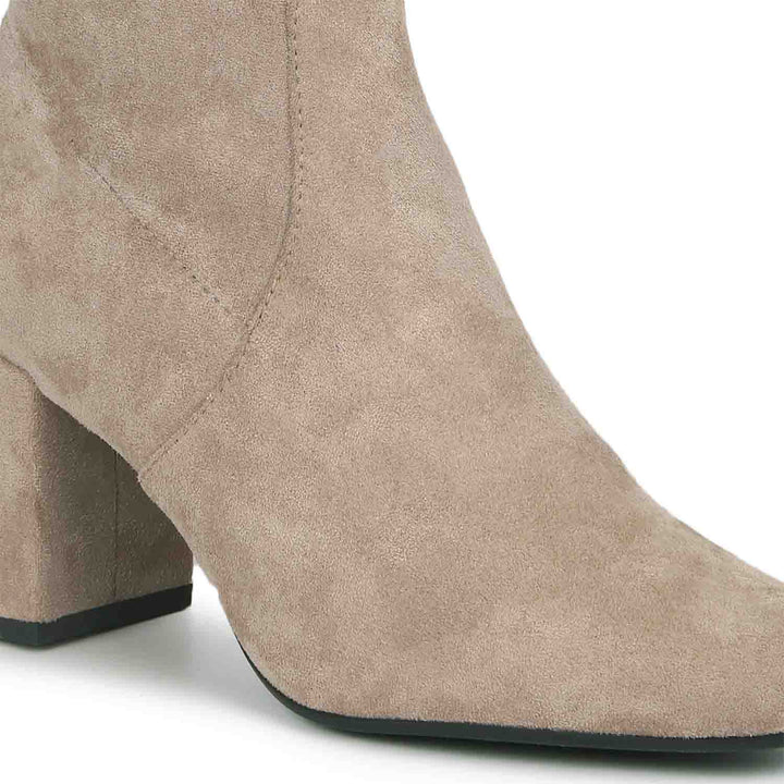 Chic above-the-knee stretch suede boots