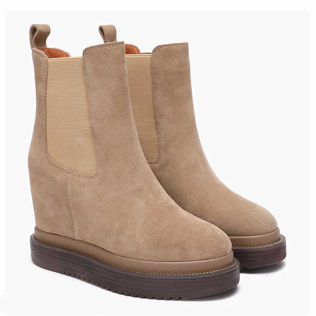 Saint Veronica Sabbia Suede Wedge Boots: Elevate your style with these chic ankle boots featuring a luxurious suede finish and comfortable wedge heel