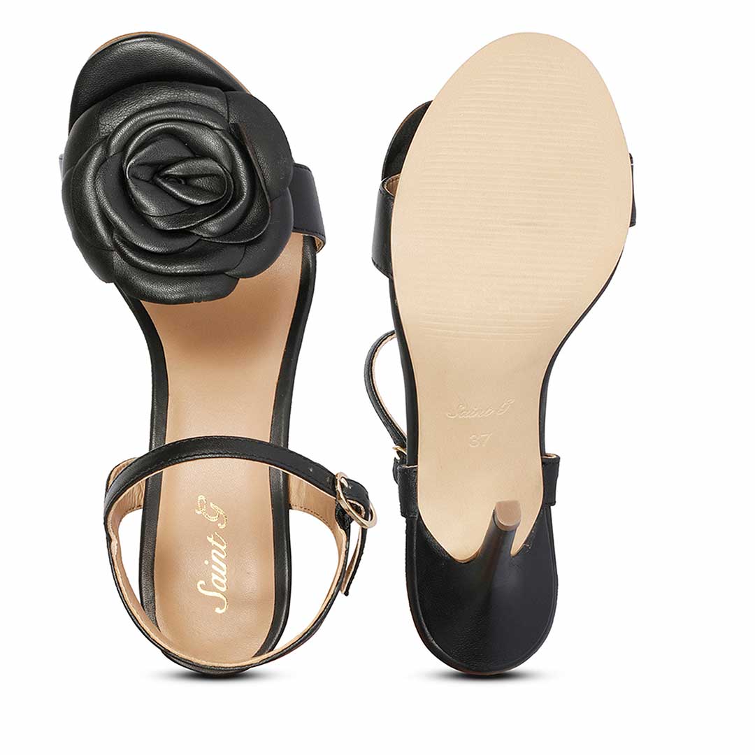 Black leather stilettos by Saint Veronique, featuring stunning floral details for a fashionable and classy look
