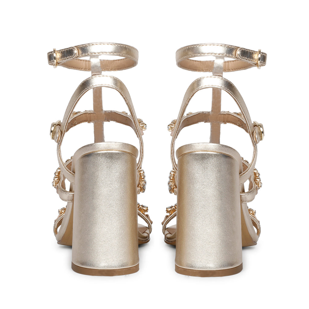 Elegant metallic heels with stone details