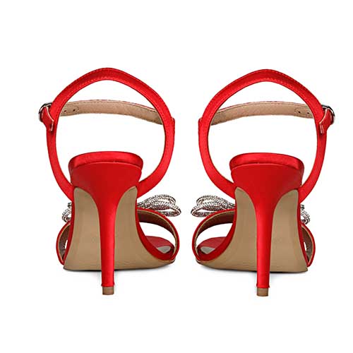 Chic red satin heels by Saint Hayden with crystal bow