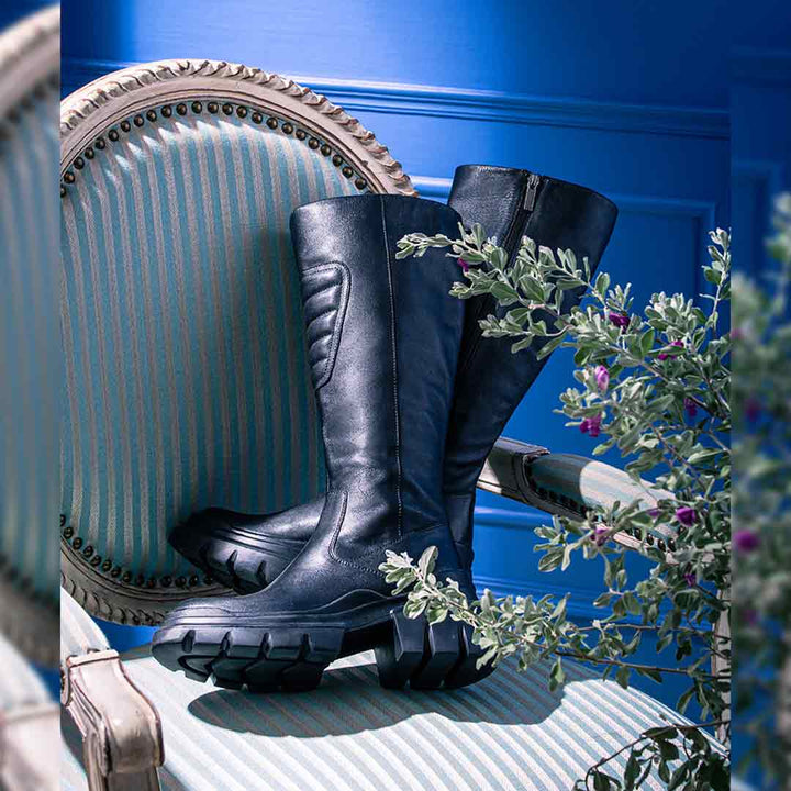 Saint Eloise black leather knee high boots, styled product editorial shot