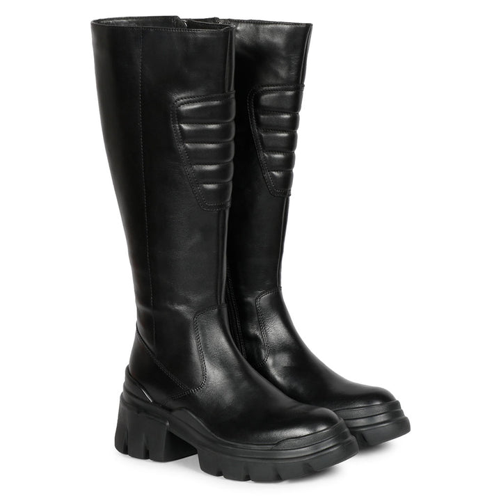 Black leather knee high boots for women UK, pair view showing lug sole and quilted panel