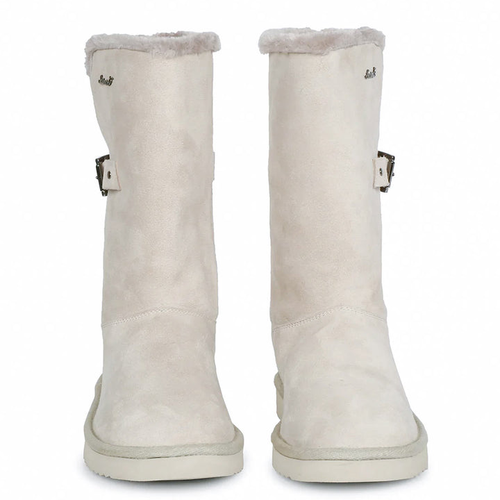 Chic ivory suede boots with decorative buckle, crafted by Saint Aurelia for snug comfort and style